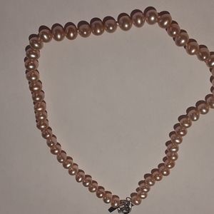 Pink fresh water pearl stand